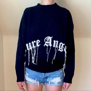 Adika “Pure Angles” black sweater